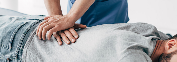 Chiropractic Southeast FL Man Having Back Adjusted