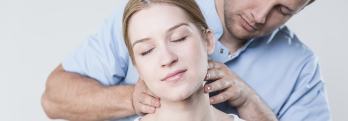 Chiropractic Southeast FL Woman Having Neck Adjusted