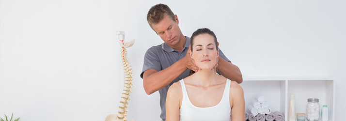 Chiropractic Southeast FL Woman Having Neck Examined