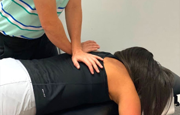 Chiropractor Southeast FL Tonya Carswell Adjusting Patient Chiropractor Southeast FL Tonya Carswell Adjusting Patient