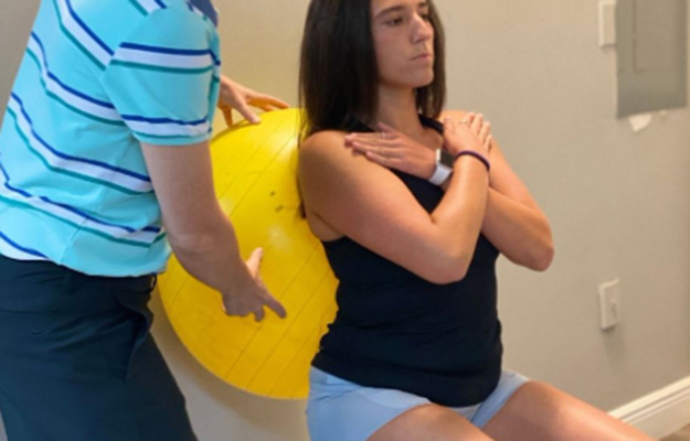 Chiropractor Southeast FL Tonya Carswell Helping Patient With Posture Chiropractor Southeast FL Tonya Carswell Helping Patient With Posture